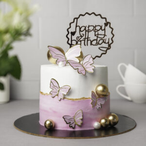 pink white cake with butterflies